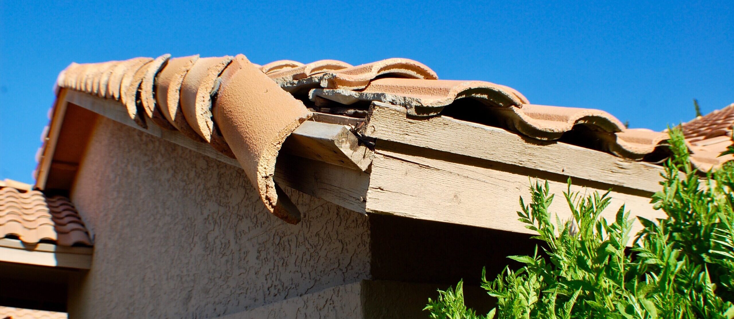 fall maintenance projects could include broken roof tiles, pictured here